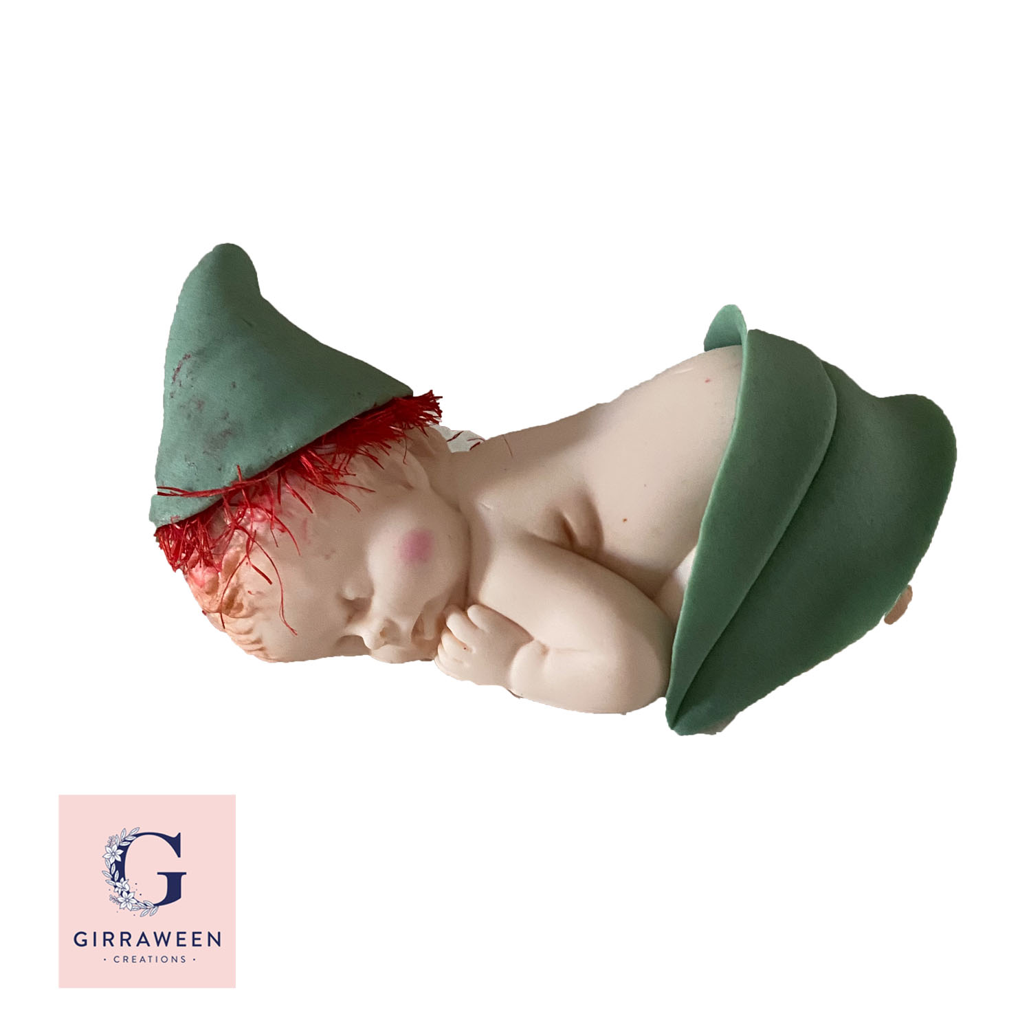 Large Sleeping Baby with Gum Flower hat and Leaves