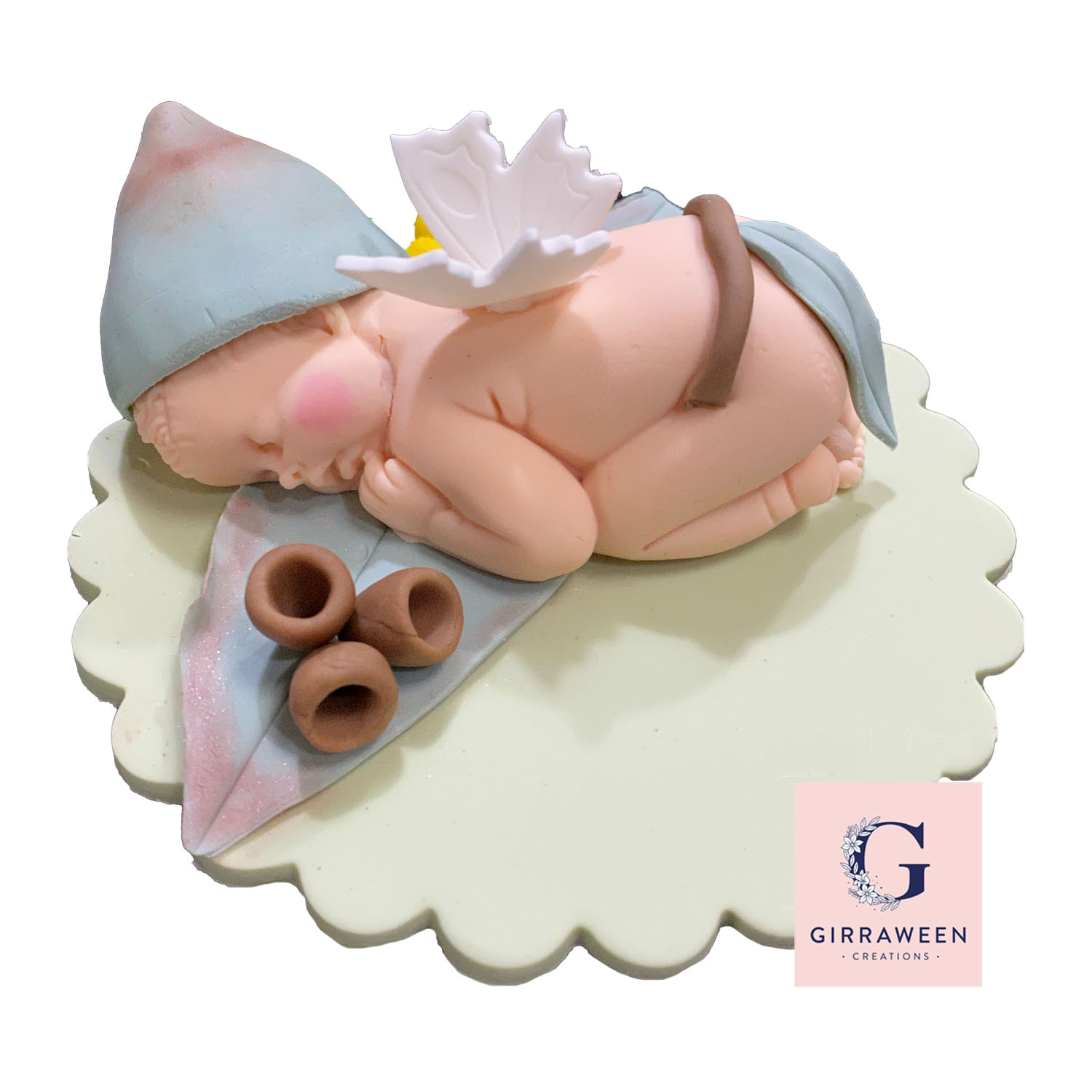 Small Baby on Plaque with Gum nut and leaves Topper